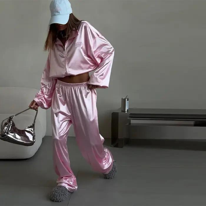 Ensemble décontracté deux pièces pour femmes, nouvelle tendance mode printemps-été 2026, veste sweat-shirt ample à col à revers et pantalon large de sport.