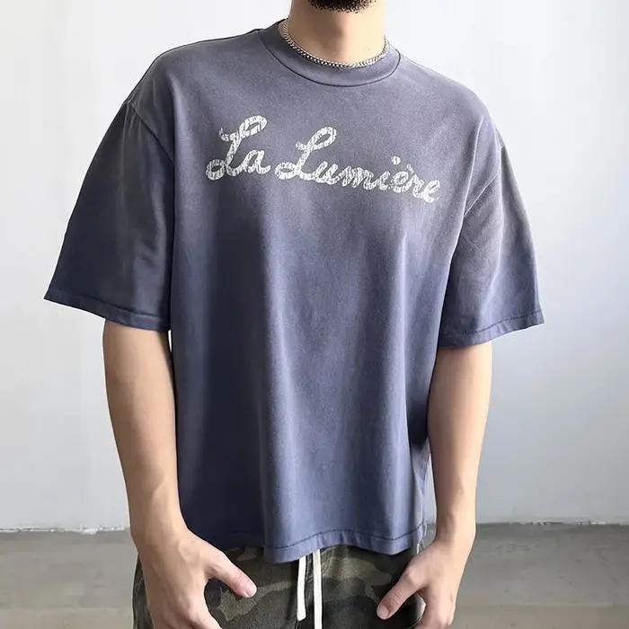 T-shirt décontracté unisexe Saint La Lumière avec logo imprimé lettres craquelées, en coton de qualité supérieure, bleu délavé vintage, coupe ample