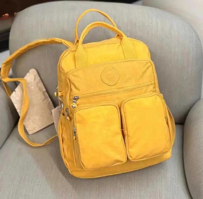 Sac à dos multi-poches en nylon pour femmes, sac de voyage décontracté, léger et robuste, idéal pour les voyages et les occasions spéciales