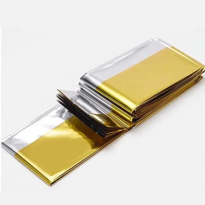 Couverture d'isolation multifonctionnelle double face pour activités de plein air et survie en extérieur finition argent multifonctionnelle polyvalente et durable