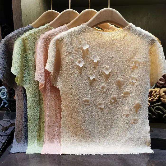 T-shirt plissé Miyake 2026 Nouveau motif floral 3D Couleur unie Manches courtes Simple Décontracté Léger Extensible Haut pour femme Vêtement sans repassage