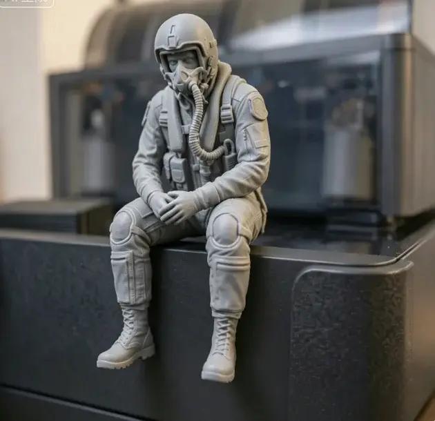 Figurine de pilote assis simulée