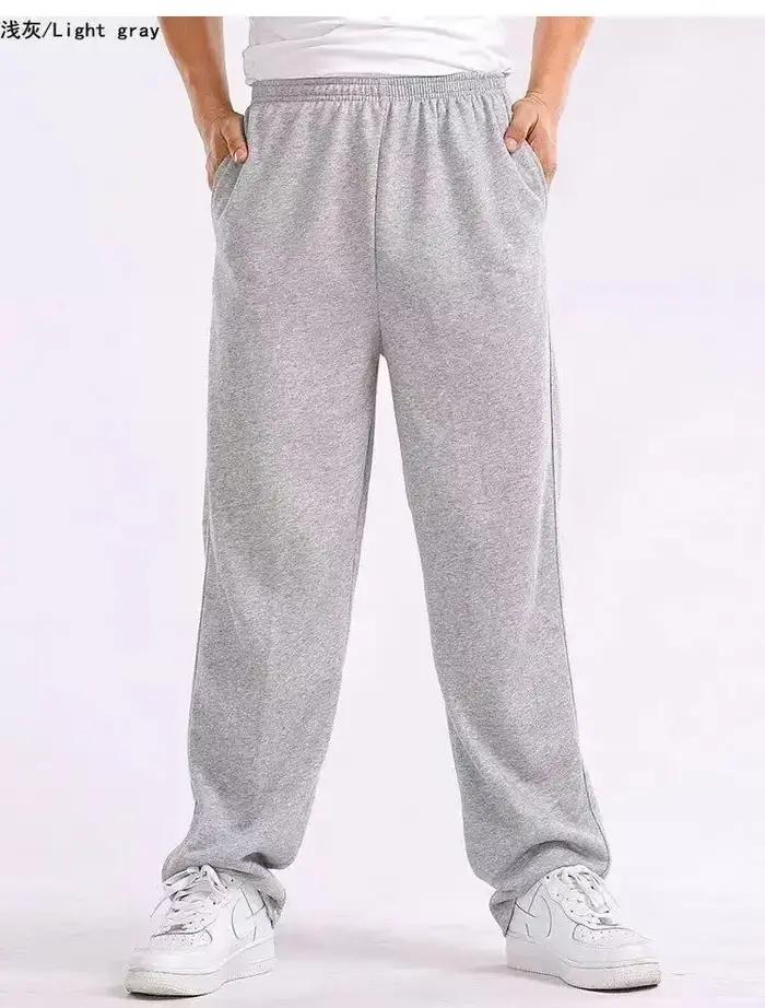 Pantalons de survêtement homme décontracté polyester ample confortable pour entraînement fitness et occasions quotidiennes