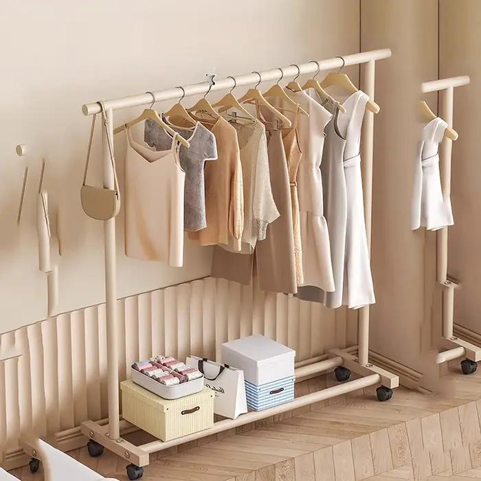 Porte-vêtements sur pied UOSU design moderne japonais acier inoxydable multifonctionel pour femmes chambre salon occasions spéciales