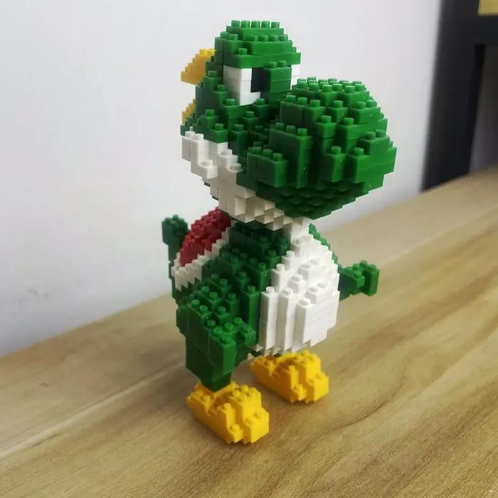 Ensemble de jouets de blocs de construction de dinosaures: vélociraptor vert et tyrannosaure, embarq