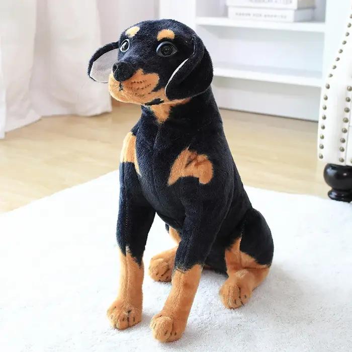 Chien en peluche en position assise simulée, chien de troupeau tacheté, chien réaliste, décoration d