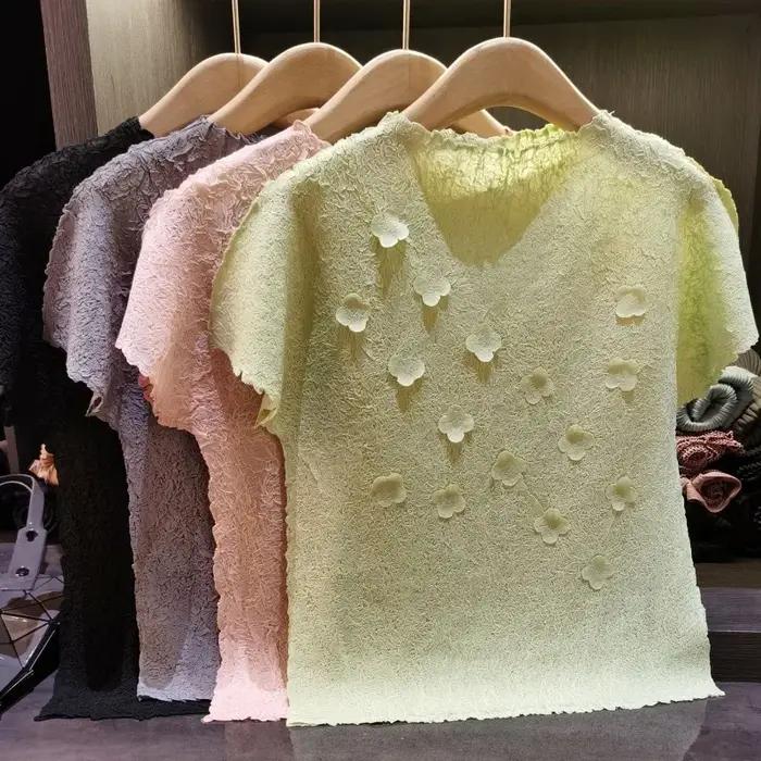 T-shirt plissé Miyake 2026 Nouveau motif floral 3D Couleur unie Manches courtes Simple Décontracté Léger Extensible Haut pour femme Vêtement sans repassage