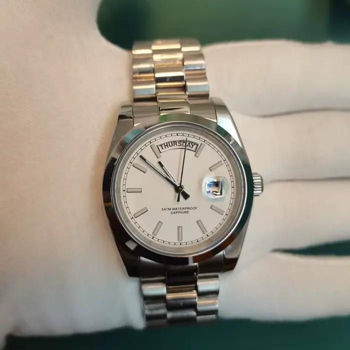 Montre homme élégante boîtier 36mm acier inoxydable verre saphir étanche 50m mouvement quartz