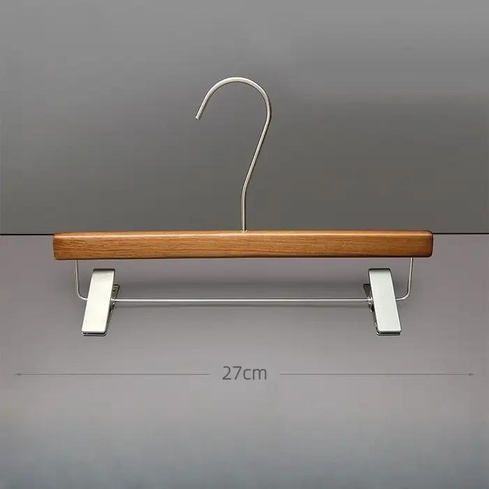 Cintre pour magasin de vêtements en bois massif peinture épaisse antidérapant non marquant pince à pantalon porte-vêtements occasions spéciales