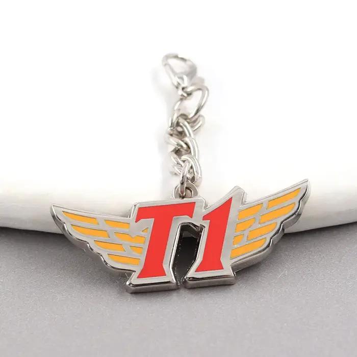 Porte-clés en métal avec logo de l'équipe T1 forme d'aile pendentif émail accessoire de collection pour fans d'e-sport cadeau pour supporters de jeux装饰去掉后的内容,保持HTML结构和最后的标题行: ```html Portez l'esprit de la compétition avec vous Plongez-vous dans l'univers captivant des e-sports avec notre porte-clés