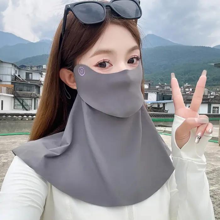 Masque en soie glacée respirant et pare-soleil pour le cou protection UV sans trace idéal pour le cyclisme et les promenades女性外出活动时佩戴的冰丝面罩优化版本标题:冰丝透气防紫外线围巾,适合户外运动和散步使用