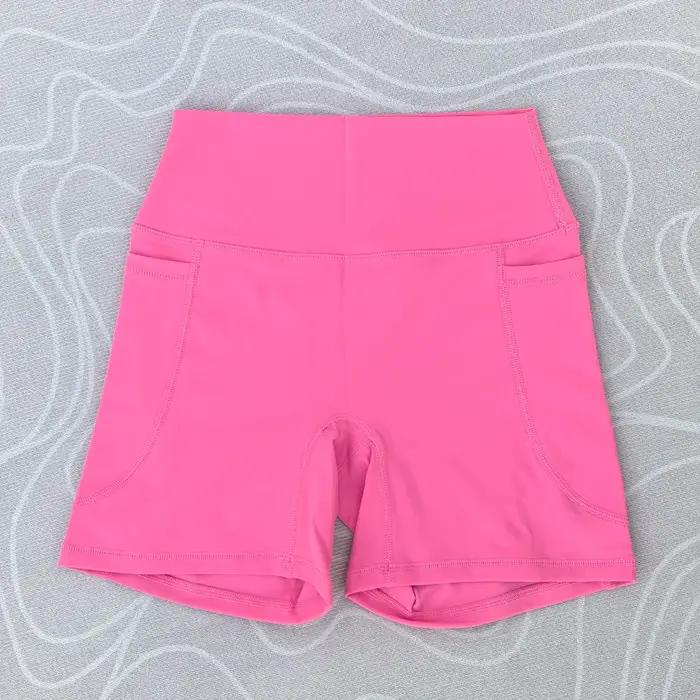 Short de sport à poches pour femmes