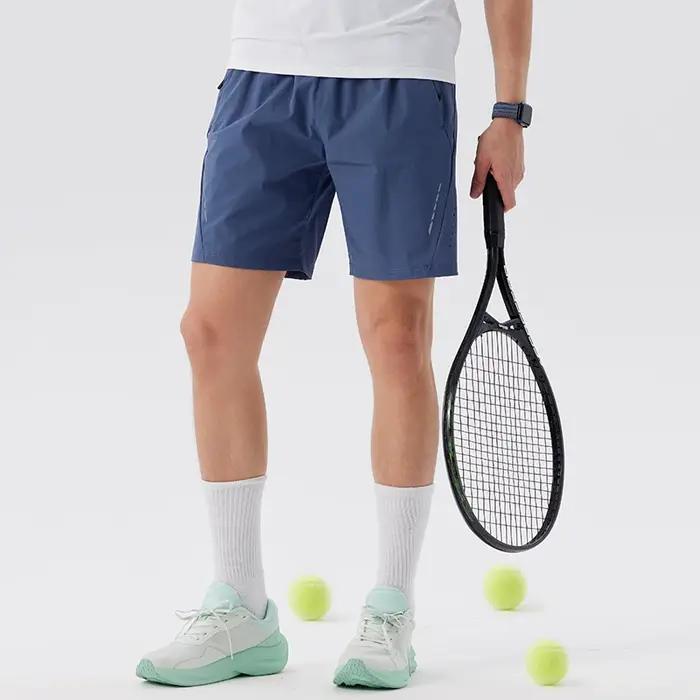 Short de tennis homme en polyester et élasthanne respirant et à séchage rapide pour entraînement et course à pied