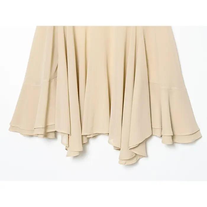 YENKYE nouvelle mode col haut Cape haut pour femmes élégantes ourlet asymétrique chemisier en mousse