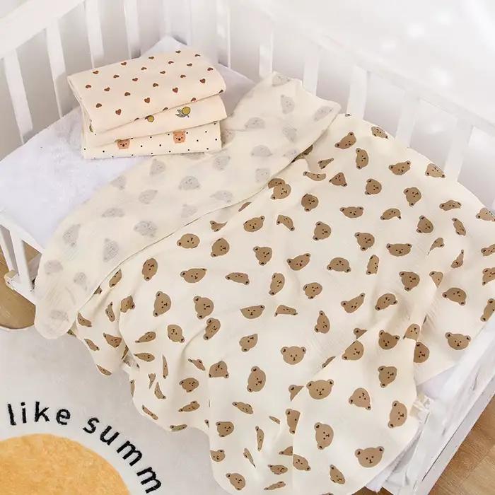 Couverture d'emmaillotage en mousseline de coton pour bébé, imprimé de dessin animé mignon, douce et