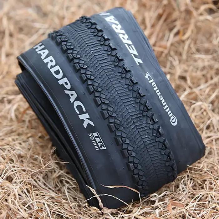 Pneu pliable Continental Terra Hardpack 27.5/29x2.0 Tubeless Ready pour VTT, route et cyclo-cross, a