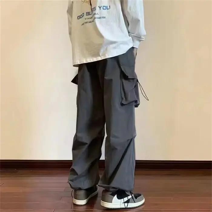 Streetwear 2024 printemps sarouel pantalons décontractés hommes taille élastique couleur unie Cargo