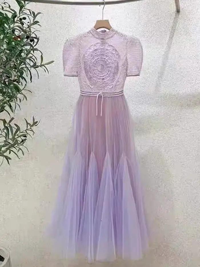 Robe longue en maille brodée pour femme