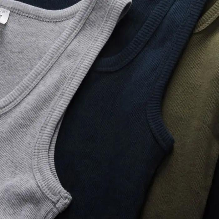 Été grande taille hommes femmes vêtements noir blanc gris débardeurs Singlets 100% coton Fitness hommes gilets musculaires t-shirt pour les femmes