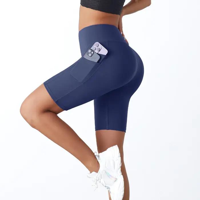 Short de yoga skinny avec poches latérales pour femme