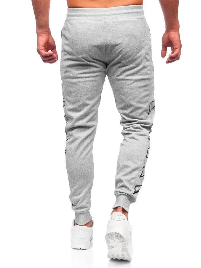 Printemps automne poche zippée hommes pantalons confortables pantalons de survêtement à séchage rapi