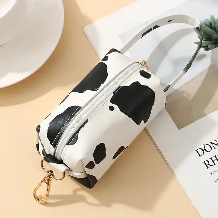 Distributeur de sacs de merde de chien motif léopard