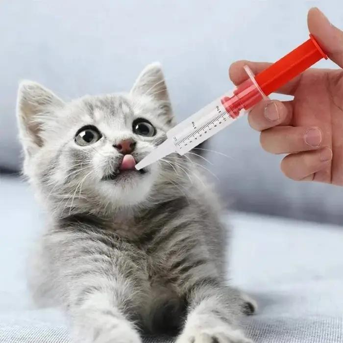 Distributeur de médicaments liquides pour chiens et chats
