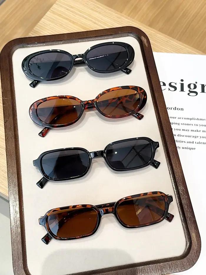 Lunettes de soleil ovales noires chic à la mode pour femmes pour les sorties et les occasions spéciales