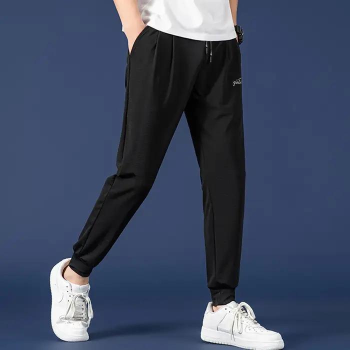 Pantalon été homme mesh soie glacée slim étudiant sport jeune chasse légère respiration rapide
