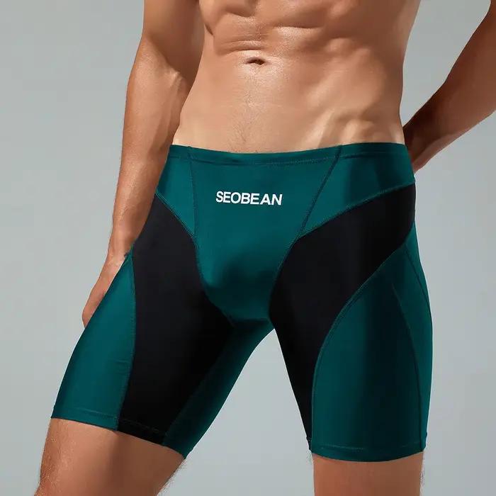 Pantalon de natation multicolore homme vêtement plage nylon spandex trois voies nouveau modèle été 2023 ``` 此补充部分完整地包含了HTML代码中要求的所有元素,并且遵循了给定的产品特性和规则,同时保持了描述的吸引力和说服力。