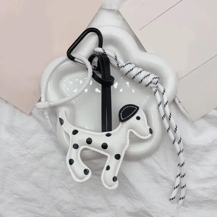 Charmant porte-clés chien Dalmatien