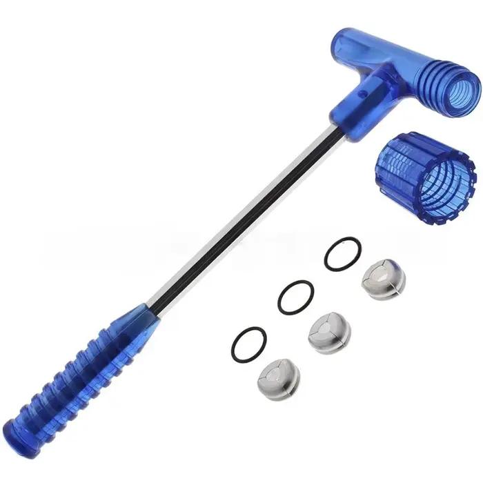 Marteau extracteur de balles avec trois jeux de pinces
