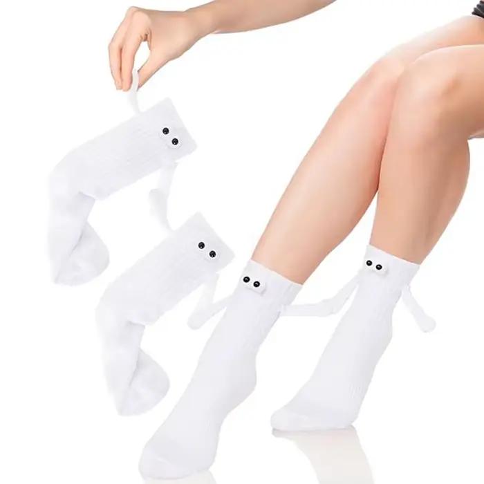 Chaussettes humoristiques adultes aimantées main dans