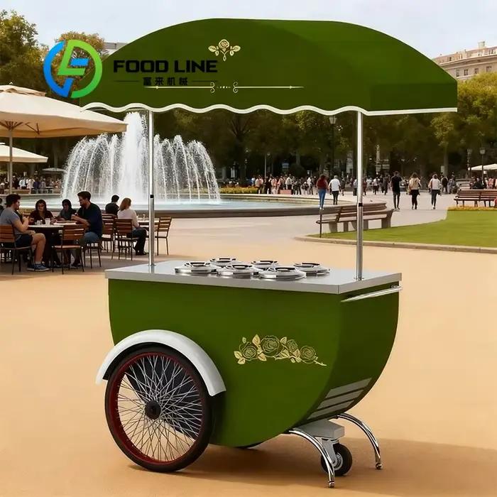 Chariot de vente mobile personnalisé en gros, stand de présentation de fleurs et de snacks pour événements commerciaux en extérieur