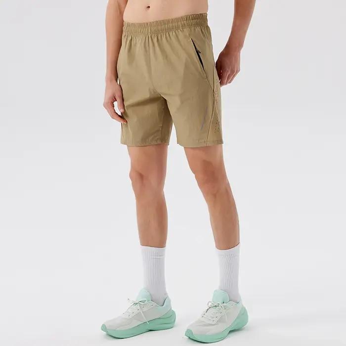 Short de tennis homme en polyester et élasthanne respirant et à séchage rapide pour entraînement et course à pied