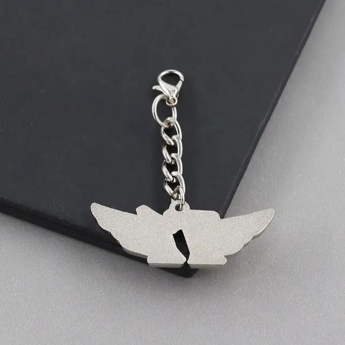 Porte-clés en métal avec logo de l'équipe T1 forme d'aile pendentif émail accessoire de collection pour fans d'e-sport cadeau pour supporters de jeux装饰去掉后的内容,保持HTML结构和最后的标题行: ```html Portez l'esprit de la compétition avec vous Plongez-vous dans l'univers captivant des e-sports avec notre porte-clés