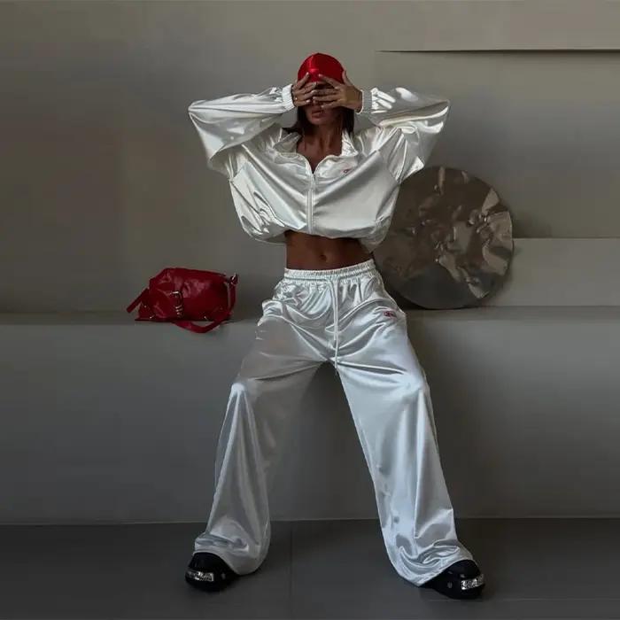 Ensemble décontracté deux pièces pour femmes, nouvelle tendance mode printemps-été 2026, veste sweat-shirt ample à col à revers et pantalon large de sport.