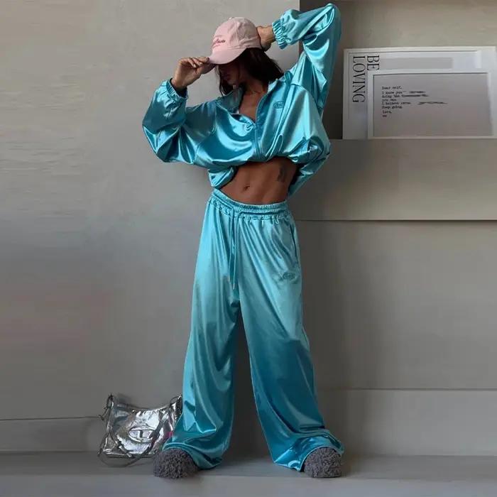 Ensemble décontracté deux pièces pour femmes, nouvelle tendance mode printemps-été 2026, veste sweat-shirt ample à col à revers et pantalon large de sport.
