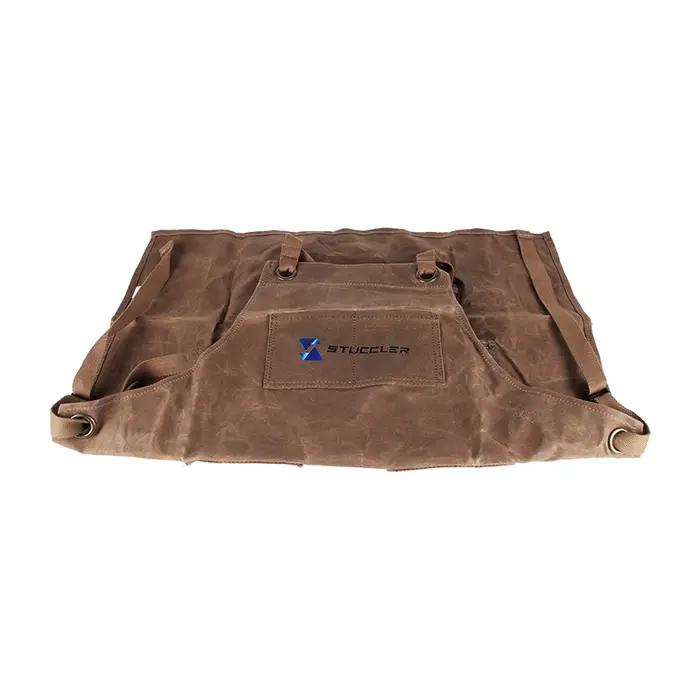 Tablier de protection en toile cireuse pour bijoutiers avec 4 poches pour outils et bretelles rembourrées marine pour sécurité et confort professionnel