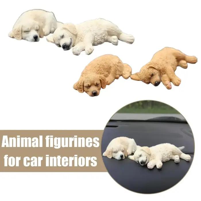 Figurine de chien dormant