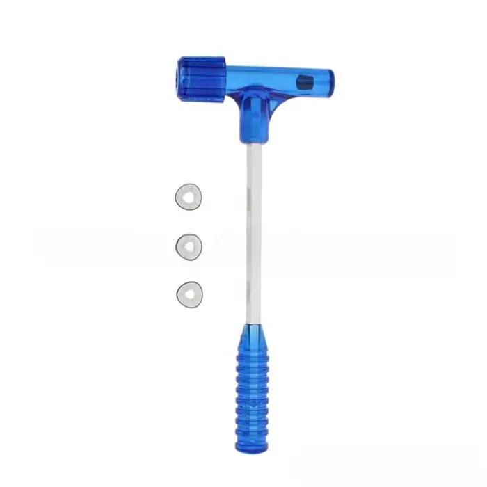 Marteau extracteur de balles avec trois jeux de pinces