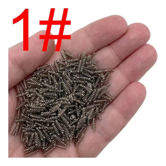 Hameçon de pêche à la carpe, 50 pièces/lot, ressort pivotant barbelé, crochet d'explosion à cercle u
